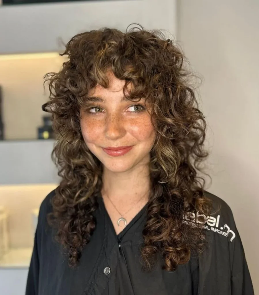 Curly Wolf Cut with Side Part