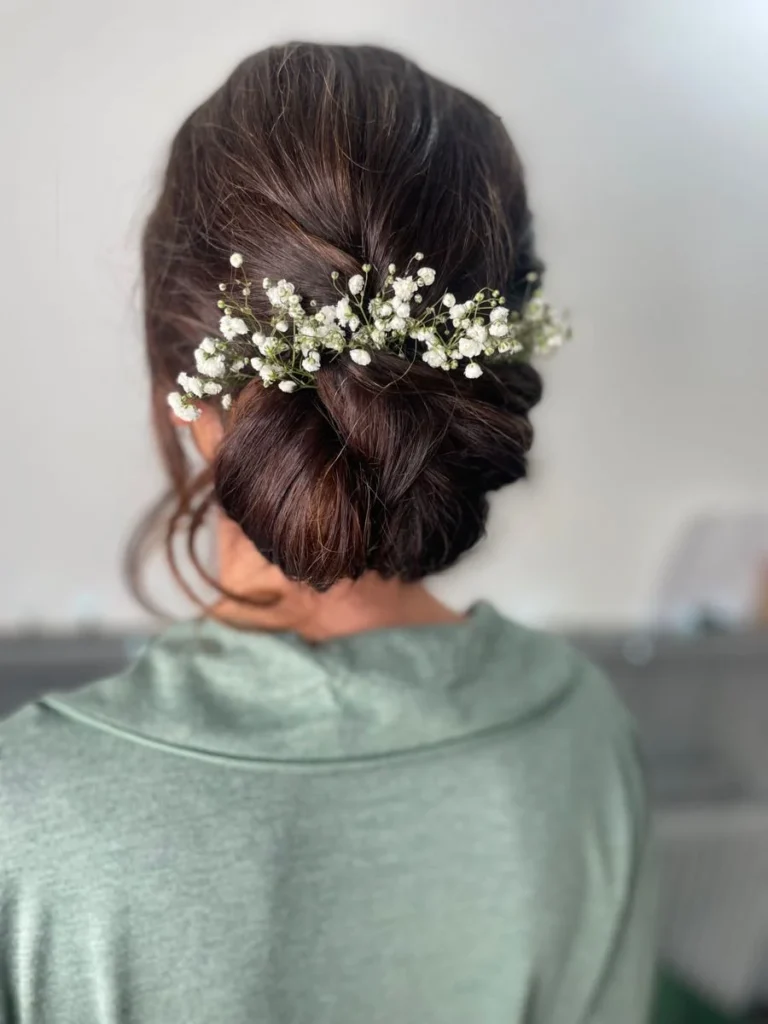 Low Bun with Floral Accents