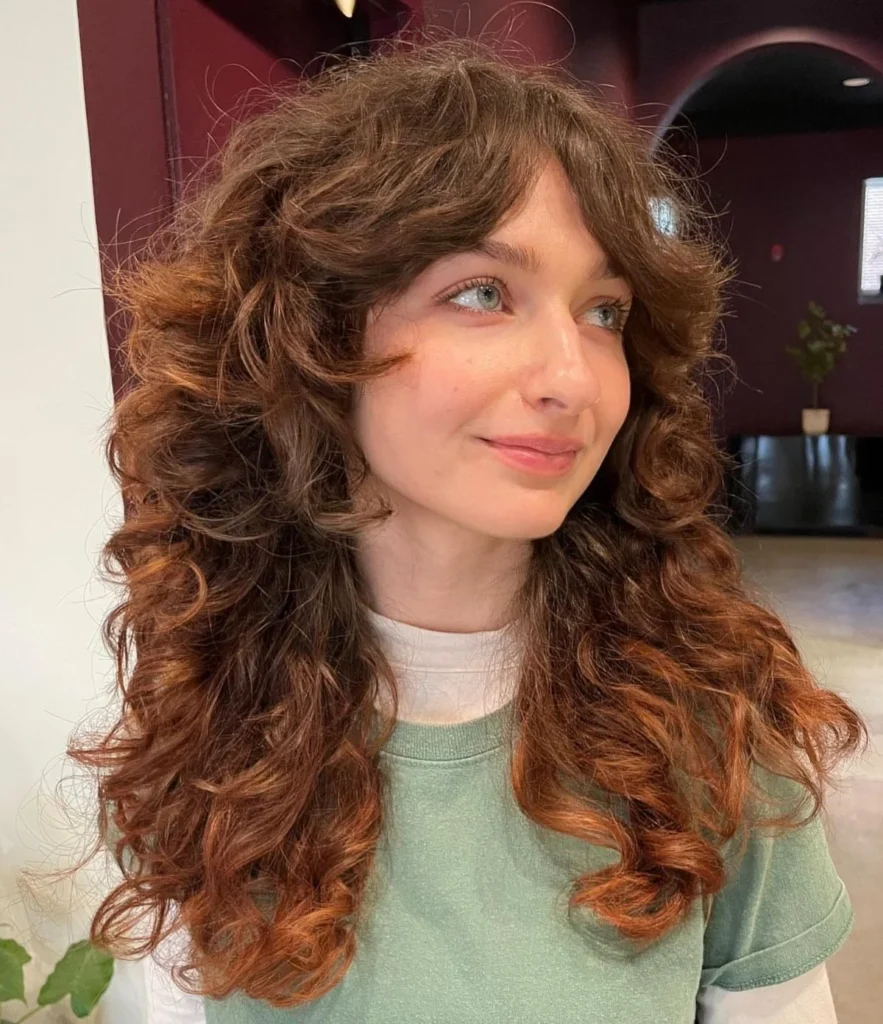 Curly Wolf Cut with Curtain Bangs