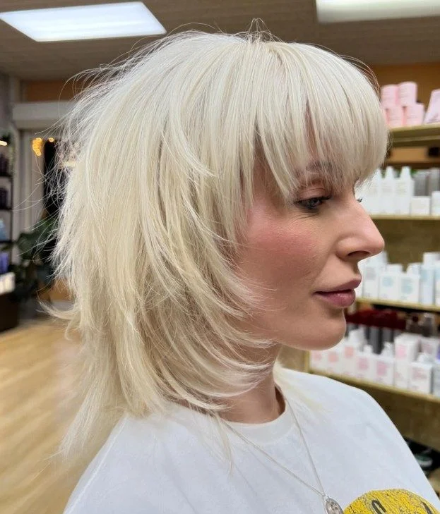 Razored Blonde Wolf Cut